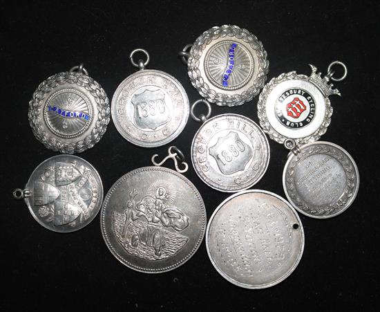 Nine assorted mainly early 20th century silver medallions.